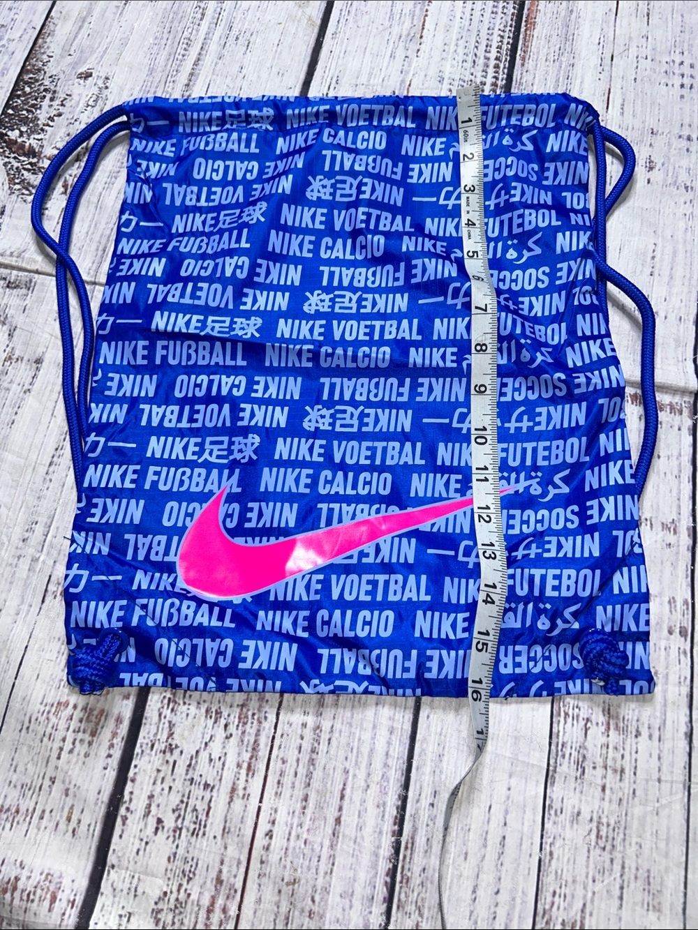 Nike Blue Drawstring Backpack with Pink Swoosh